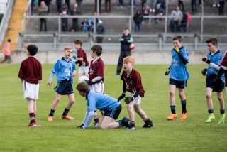 U12 Footballers Play at Half time in All Ireland U21 Football Final
