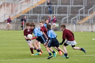 U12 Footballers Play at Half time in All Ireland U21 Football Final