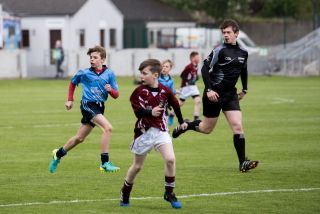 U12 Footballers Play at Half time in All Ireland U21 Football Final