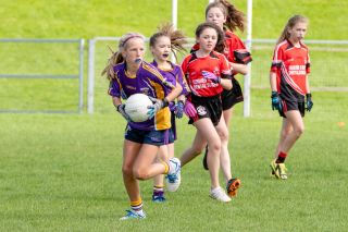 Kilmacud Crokes Under 12 Ladies Footballers at Carryduff GAA blitz in Belfast on 25th of August