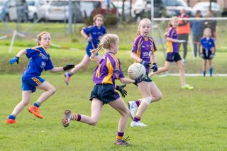 Kilmacud Crokes Under 12 Ladies Footballers at Carryduff GAA blitz in Belfast on 25th of August