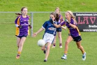 Kilmacud Crokes Under 12 Ladies Footballers at Carryduff GAA blitz in Belfast on 25th of August
