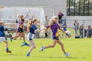 Kilmacud Crokes Under 12 Ladies Footballers at Carryduff GAA blitz in Belfast on 25th of August