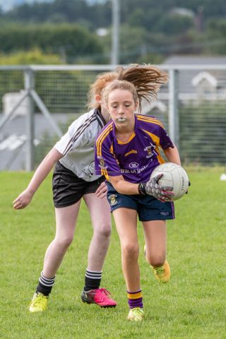 Kilmacud Crokes Under 12 Ladies Footballers at Carryduff GAA blitz in Belfast on 25th of August