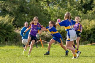 Kilmacud Crokes Under 12 Ladies Footballers at Carryduff GAA blitz in Belfast on 25th of August