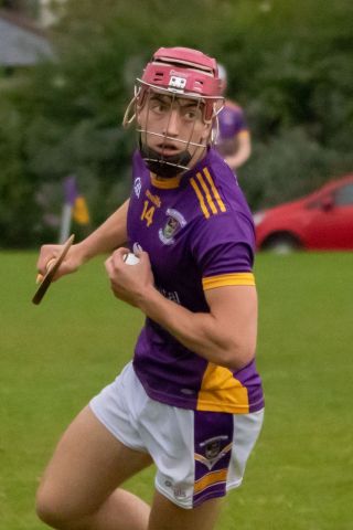 Crokes beat Faughs in torrential rain