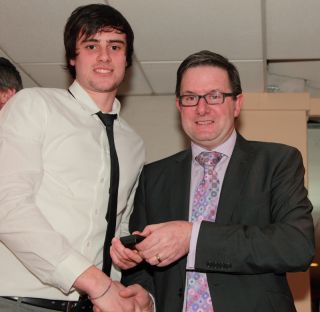 Senior medal presentation by Sean Shanley to Niall Corcoran