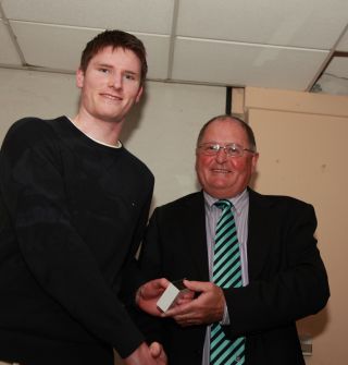 Senior medal presentation by Sean Shanley to Damian Kelly