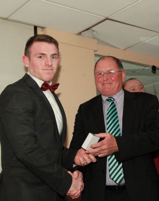 Senior medal presentation by Sean Shanley to Declan Browne