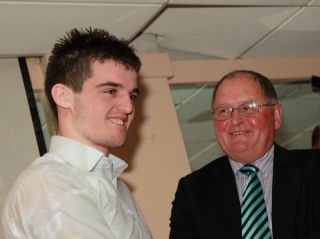 Senior medal presentation by Sean Shanley to Jude Sweeney