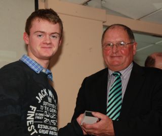 Senior medal presentation by Sean Shanley to Liam O'Carroll