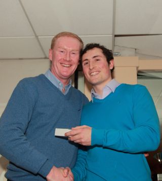 Senior Team presentation by Ross O'Carroll to Gearóid Ó Riain