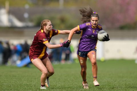 Crokes number 18 evading a tackle