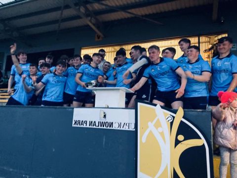 Dubs U19's celebrate with the Cup.