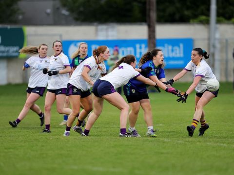 Three Crokes players close down Sylvesters player with ball