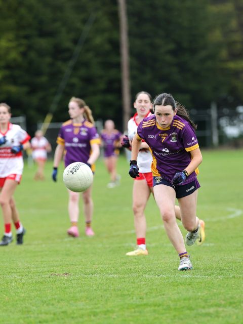Kilmacud no 7 chasing bouncing ball